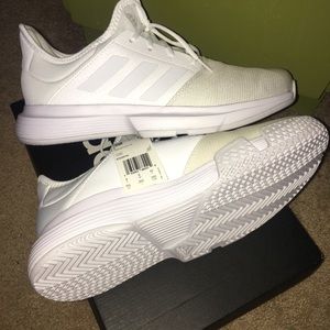 Adidas gamecourt white tennis shoes.